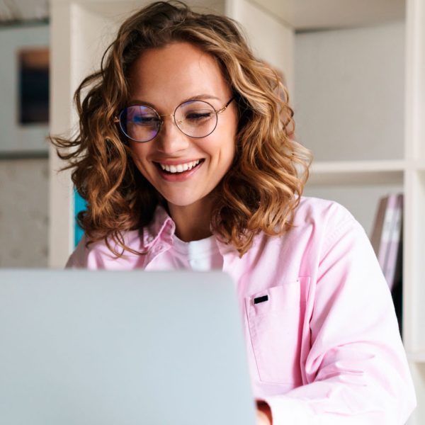 photo-of-joyful-woman-wearing-eyeglasses-smiling-a-8EUXMDJ.jpg